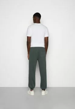 YOURTURN Oversized Unisex - Trainingsbroek -Dark Green -YOURTURN WINKEL 42776076c49c4d49984fa3254d41719b