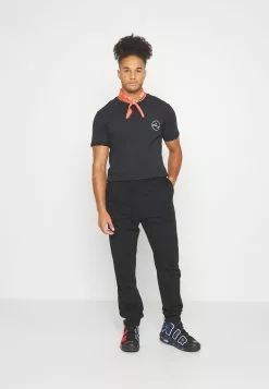 YOURTURN Unisex - Trainingsbroek - Black -YOURTURN WINKEL 4726d7ee4d5647f8a5f5c8ffe5554ff0