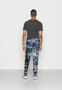 YOURTURN Monochrome Tie Dye Jogger Unisex - Trainingsbroek - Black/Off White -YOURTURN WINKEL 7793c33a8ea44501a122fcabc111a020