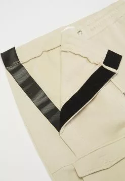 YOURTURN Trainingsbroek - Beige -YOURTURN WINKEL d9756528a5f046829b9e56dbebee00ba