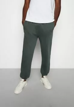 YOURTURN Oversized Unisex - Trainingsbroek -Dark Green -YOURTURN WINKEL e034143c08c84d0d8184e89ab87f6ca8